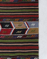 Vintage kilim rug in living room setting, bright colors, wild shaman, soft rug, bold color, Portland, Oregon, rug store, rug shop, local shop, vintage rug, modern kilim, warm colors, antique kilim rug