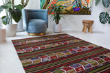 Vintage kilim rug in living room setting, bright colors, wild shaman, soft rug, bold color, Portland, Oregon, rug store, rug shop, local shop, vintage rug, modern kilim, warm colors, antique kilim rug