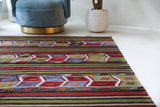 Vintage kilim rug in living room setting, bright colors, wild shaman, soft rug, bold color, Portland, Oregon, rug store, rug shop, local shop, vintage rug, modern kilim, warm colors, antique kilim rug