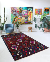 Vintage kilim rug in living room setting, bright colors, wild shaman, soft rug, bold color, Portland, Oregon, rug store, rug shop, local shop, vintage rug, modern kilim, warm colors, antique kilim rug