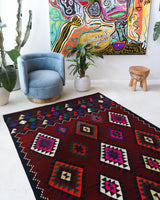 Vintage kilim rug in living room setting, bright colors, wild shaman, soft rug, bold color, Portland, Oregon, rug store, rug shop, local shop, vintage rug, modern kilim, warm colors, antique kilim rug