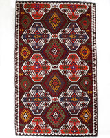 Vintage kilim rug in living room setting, bright colors, wild shaman, soft rug, bold color, Portland, Oregon, rug store, rug shop, local shop, vintage rug, modern kilim, warm colors, antique kilim rug