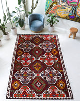 Vintage kilim rug in living room setting, bright colors, wild shaman, soft rug, bold color, Portland, Oregon, rug store, rug shop, local shop, vintage rug, modern kilim, warm colors, antique kilim rug