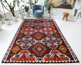 Vintage kilim rug in living room setting, bright colors, wild shaman, soft rug, bold color, Portland, Oregon, rug store, rug shop, local shop, vintage rug, modern kilim, warm colors, antique kilim rug