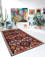 Vintage kilim rug in living room setting, bright colors, wild shaman, soft rug, bold color, Portland, Oregon, rug store, rug shop, local shop, vintage rug, modern kilim, warm colors, antique kilim rug