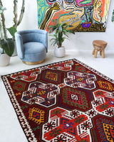 Vintage kilim rug in living room setting, bright colors, wild shaman, soft rug, bold color, Portland, Oregon, rug store, rug shop, local shop, vintage rug, modern kilim, warm colors, antique kilim rug