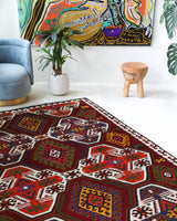 Vintage kilim rug in living room setting, bright colors, wild shaman, soft rug, bold color, Portland, Oregon, rug store, rug shop, local shop, vintage rug, modern kilim, warm colors, antique kilim rug