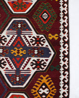 Vintage kilim rug in living room setting, bright colors, wild shaman, soft rug, bold color, Portland, Oregon, rug store, rug shop, local shop, vintage rug, modern kilim, warm colors, antique kilim rug