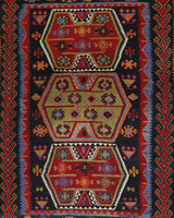 Vintage kilim rug in living room setting, bright colors, wild shaman, soft rug, bold color, Portland, Oregon, rug store, rug shop, local shop, vintage rug, modern kilim, warm colors, antique kilim rug