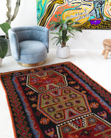 Vintage kilim rug in living room setting, bright colors, wild shaman, soft rug, bold color, Portland, Oregon, rug store, rug shop, local shop, vintage rug, modern kilim, warm colors, antique kilim rug