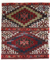 Vintage kilim rug in living room setting, old rug, antique rug, pastel colors, faded colors, Turkish rug, vintage rug, soft rug, Portland, Oregon, rug store, rug shop, local shop, earthy tones, earthy colors, warm colors