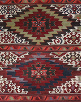 Vintage kilim rug in living room setting, old rug, antique rug, pastel colors, faded colors, Turkish rug, vintage rug, soft rug, Portland, Oregon, rug store, rug shop, local shop, earthy tones, earthy colors, warm colors