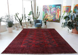 Antique Turkmen rug in a living room setting, pile rug, Turkish rug, vintage rug, portland, rug shop, bright colors, wild shaman, soft rug, bold color, Portland, Oregon, rug store, rug shop, local shop, antique rug