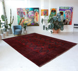 Antique Turkmen rug in a living room setting, pile rug, Turkish rug, vintage rug, portland, rug shop, bright colors, wild shaman, soft rug, bold color, Portland, Oregon, rug store, rug shop, local shop, antique rug