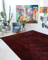 Antique Turkmen rug in a living room setting, pile rug, Turkish rug, vintage rug, portland, rug shop, bright colors, wild shaman, soft rug, bold color, Portland, Oregon, rug store, rug shop, local shop, antique rug