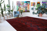 Antique Turkmen rug in a living room setting, pile rug, Turkish rug, vintage rug, portland, rug shop, bright colors, wild shaman, soft rug, bold color, Portland, Oregon, rug store, rug shop, local shop, antique rug