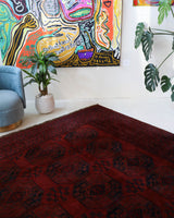 Antique Turkmen rug in a living room setting, pile rug, Turkish rug, vintage rug, portland, rug shop, bright colors, wild shaman, soft rug, bold color, Portland, Oregon, rug store, rug shop, local shop, antique rug