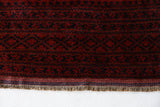 Antique Turkmen rug in a living room setting, pile rug, Turkish rug, vintage rug, portland, rug shop, bright colors, wild shaman, soft rug, bold color, Portland, Oregon, rug store, rug shop, local shop, antique rug