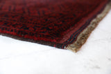 Antique Turkmen rug in a living room setting, pile rug, Turkish rug, vintage rug, portland, rug shop, bright colors, wild shaman, soft rug, bold color, Portland, Oregon, rug store, rug shop, local shop, antique rug
