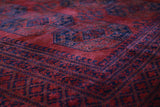 Antique Turkmen rug in a living room setting, pile rug, Turkish rug, vintage rug, portland, rug shop, bright colors, wild shaman, soft rug, bold color, Portland, Oregon, rug store, rug shop, local shop, antique rug