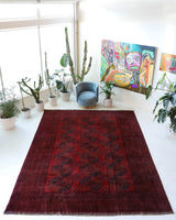 Antique Turkmen rug in a living room setting, pile rug, Turkish rug, vintage rug, portland, rug shop, bright colors, wild shaman, soft rug, bold color, Portland, Oregon, rug store, rug shop, local shop, antique rug