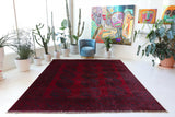 Antique Turkmen rug in a living room setting, pile rug, Turkish rug, vintage rug, portland, rug shop, bright colors, wild shaman, soft rug, bold color, Portland, Oregon, rug store, rug shop, local shop, antique rug