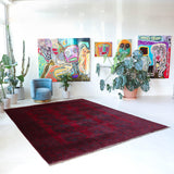 Antique Turkmen rug in a living room setting, pile rug, Turkish rug, vintage rug, portland, rug shop, bright colors, wild shaman, soft rug, bold color, Portland, Oregon, rug store, rug shop, local shop, antique rug