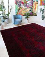 Antique Turkmen rug in a living room setting, pile rug, Turkish rug, vintage rug, portland, rug shop, bright colors, wild shaman, soft rug, bold color, Portland, Oregon, rug store, rug shop, local shop, antique rug