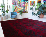 Antique Turkmen rug in a living room setting, pile rug, Turkish rug, vintage rug, portland, rug shop, bright colors, wild shaman, soft rug, bold color, Portland, Oregon, rug store, rug shop, local shop, antique rug