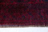 Antique Turkmen rug in a living room setting, pile rug, Turkish rug, vintage rug, portland, rug shop, bright colors, wild shaman, soft rug, bold color, Portland, Oregon, rug store, rug shop, local shop, antique rug