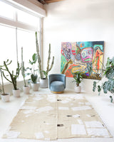 Vintage kilim rug in living room setting, old rug, antique rug, pastel colors, faded colors, Turkish rug, vintage rug, soft rug, Portland, Oregon, rug store, rug shop, local shop, earthy tones, earthy colors, warm colors