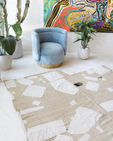 Vintage kilim rug in living room setting, old rug, antique rug, pastel colors, faded colors, Turkish rug, vintage rug, soft rug, Portland, Oregon, rug store, rug shop, local shop, earthy tones, earthy colors, warm colors