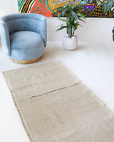 Vintage Turkish runner rug in living room setting, old rug, antique rug, pastel colors, faded colors, Turkish rug, vintage rug, soft rug, Portland, Oregon, rug store, rug shop, local shop