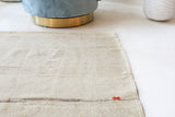 Vintage Turkish runner rug in living room setting, old rug, antique rug, pastel colors, faded colors, Turkish rug, vintage rug, soft rug, Portland, Oregon, rug store, rug shop, local shop