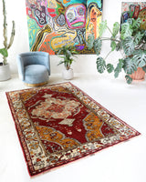 Vintage Turkish rug in a living room setting, Area rug in a living room setting, pile rug, Turkish rug, custom rug, modern rug, portland, rug shop, bright colors, wild shaman, soft rug, bold color, Portland, Oregon, rug store, rug shop, local shop