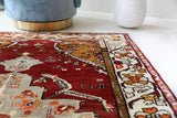 Vintage Turkish rug in a living room setting, Area rug in a living room setting, pile rug, Turkish rug, custom rug, modern rug, portland, rug shop, bright colors, wild shaman, soft rug, bold color, Portland, Oregon, rug store, rug shop, local shop