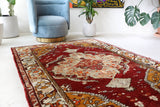 Vintage Turkish rug in a living room setting, Area rug in a living room setting, pile rug, Turkish rug, custom rug, modern rug, portland, rug shop, bright colors, wild shaman, soft rug, bold color, Portland, Oregon, rug store, rug shop, local shop