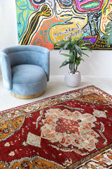 Vintage Turkish rug in a living room setting, Area rug in a living room setting, pile rug, Turkish rug, custom rug, modern rug, portland, rug shop, bright colors, wild shaman, soft rug, bold color, Portland, Oregon, rug store, rug shop, local shop