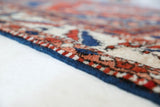 Vintage Turkish rug in a living room setting, pile rug, Turkish rug, vintage rug, portland, rug shop, bright colors, wild shaman, soft rug, bold color, Portland, Oregon, rug store, rug shop, local shop, antique rug