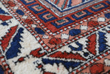 Vintage Turkish rug in a living room setting, pile rug, Turkish rug, vintage rug, portland, rug shop, bright colors, wild shaman, soft rug, bold color, Portland, Oregon, rug store, rug shop, local shop, antique rug