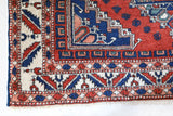Vintage Turkish rug in a living room setting, pile rug, Turkish rug, vintage rug, portland, rug shop, bright colors, wild shaman, soft rug, bold color, Portland, Oregon, rug store, rug shop, local shop, antique rug