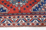 Vintage Turkish rug in a living room setting, pile rug, Turkish rug, vintage rug, portland, rug shop, bright colors, wild shaman, soft rug, bold color, Portland, Oregon, rug store, rug shop, local shop, antique rug