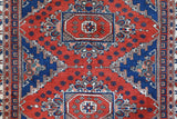 Vintage Turkish rug in a living room setting, pile rug, Turkish rug, vintage rug, portland, rug shop, bright colors, wild shaman, soft rug, bold color, Portland, Oregon, rug store, rug shop, local shop, antique rug