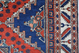 Vintage Turkish rug in a living room setting, pile rug, Turkish rug, vintage rug, portland, rug shop, bright colors, wild shaman, soft rug, bold color, Portland, Oregon, rug store, rug shop, local shop, antique rug