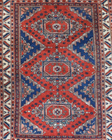 Vintage Turkish rug in a living room setting, pile rug, Turkish rug, vintage rug, portland, rug shop, bright colors, wild shaman, soft rug, bold color, Portland, Oregon, rug store, rug shop, local shop, antique rug