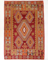 Vintage kilim rug in room decor setting, old rug, antique rug, pastel colors, faded colors, Turkish rug, vintage rug, soft rug, Portland, Oregon, rug store, rug shop, local shop, antique kilim rug, bold colors, bright colors