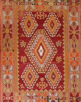 Vintage kilim rug in room decor setting, old rug, antique rug, pastel colors, faded colors, Turkish rug, vintage rug, soft rug, Portland, Oregon, rug store, rug shop, local shop, antique kilim rug, bold colors, bright colors