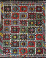 Vintage kilim rug in living room setting, bright colors, wild shaman, soft rug, bold color, Portland, Oregon, rug store, rug shop, local shop, vintage rug, modern kilim, warm colors, antique kilim rug