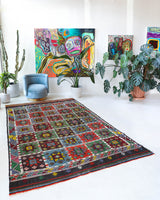 Vintage kilim rug in living room setting, bright colors, wild shaman, soft rug, bold color, Portland, Oregon, rug store, rug shop, local shop, vintage rug, modern kilim, warm colors, antique kilim rug