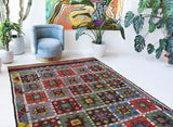 Vintage kilim rug in living room setting, bright colors, wild shaman, soft rug, bold color, Portland, Oregon, rug store, rug shop, local shop, vintage rug, modern kilim, warm colors, antique kilim rug